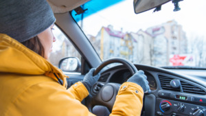 A person driving a car