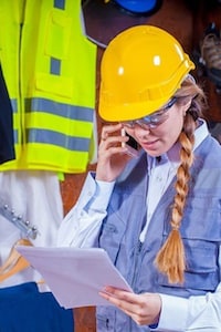 Worker on cellophone